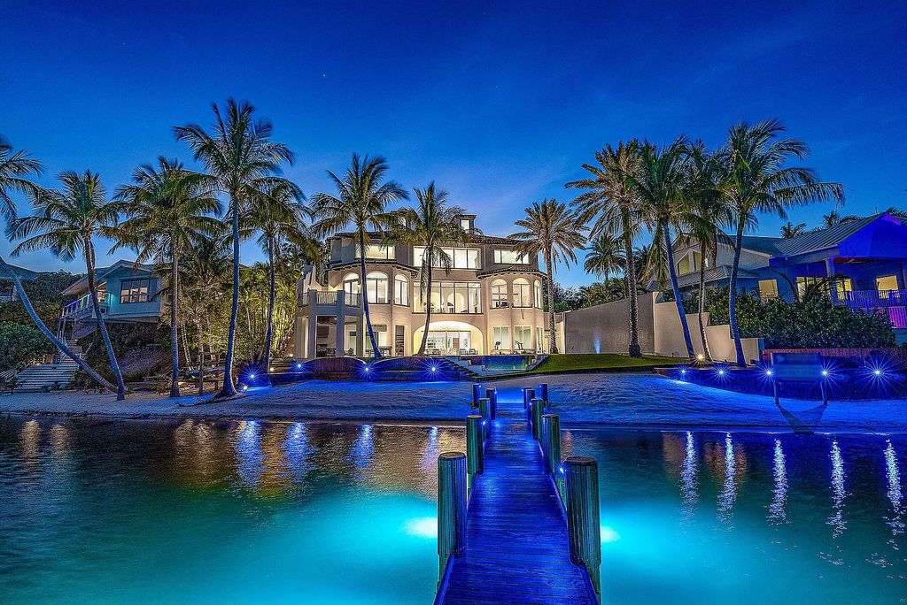 Experience luxury living at 17553 SE Conch Bar Avenue, Jupiter, Florida! This One-Of-A-Kind Grand Intracoastal Estate boasts 9 bedrooms, 10 bathrooms, and 15,066 square feet of living space on a 0.43-acre lot.