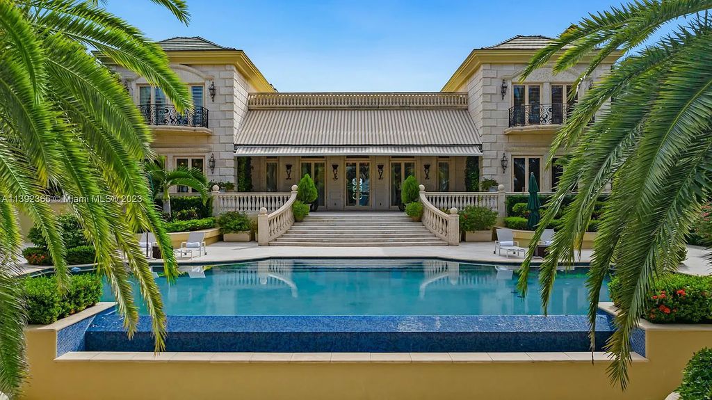 Welcome to 12 Indian Creek Island Road, Indian Creek, Florida! This stunning estate is the only available home in the exclusive Indian Creek community. With timeless European glamour and nearly 2 acres of grounds, it exudes elegance and luxury.