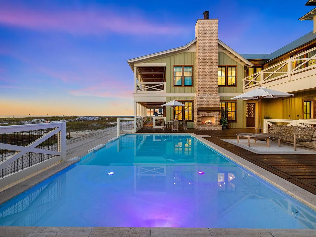 Discover "The Grayton House" at 10 Hotz Avenue, Santa Rosa Beach, Florida. A harmonious fusion of historical significance and modern elements, this 7-bed, 9-bath home boasts 5,624 sqft on a 0.27-acre lot.