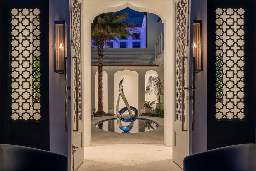 Welcome to 16 N McGee Drive, Inlet Beach, Florida, a stunning Moroccan-style home. Built in 2020, this unique property boasts 3 beds, 4 baths, and 2,741 sqft of luxurious living space.