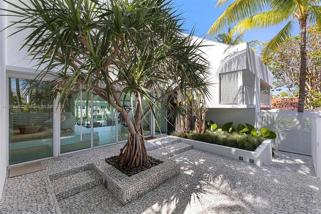 Experience luxury living at 161 Cape Florida Drive, Key Biscayne, Florida in this fully renovated 4-bed, 5-bath Key Biscayne waterfront home with breathtaking canal views.