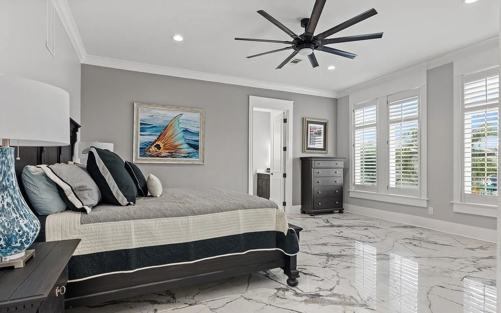 Experience ultimate waterfront living at 4522 Bay Point Road, Panama City Beach, Florida. Recently redesigned and finished in 2022, this 5-bed, 7-bath estate boasts Italian marble floors, intricate woodwork, and stunning indoor/outdoor living spaces.
