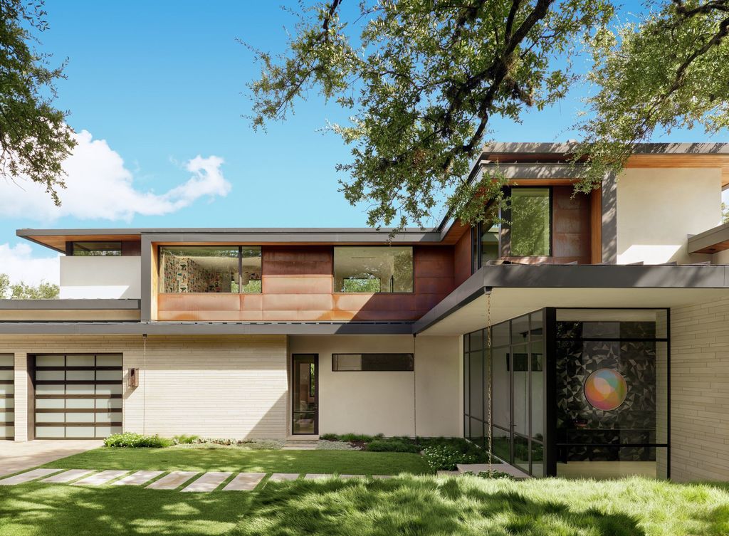 The Cliffside House with Perched Above Lake Austin by LaRue Architects