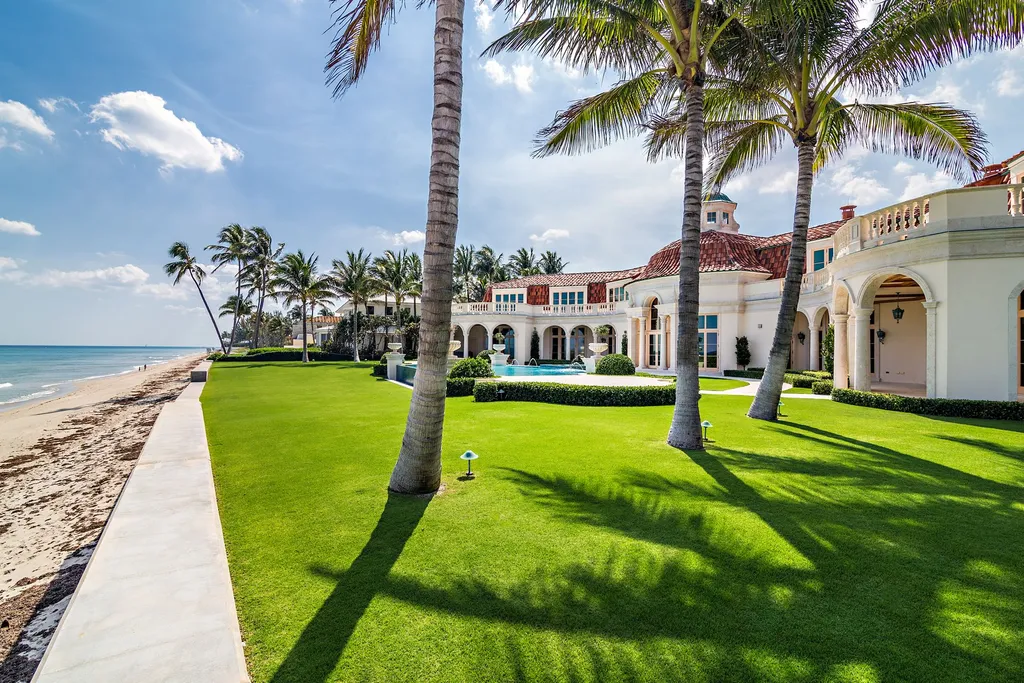 1070 N Ocean Boulevard Home in Palm Beach, Florida. Welcome to this breathtaking direct oceanfront estate, meticulously designed by Thomas Kirchhoff with stunning interiors by David Kleinberg. This exceptional home exudes grandeur and offers an excellent floor plan, featuring 7 bedrooms, 7 bathrooms, and 5 powder rooms.