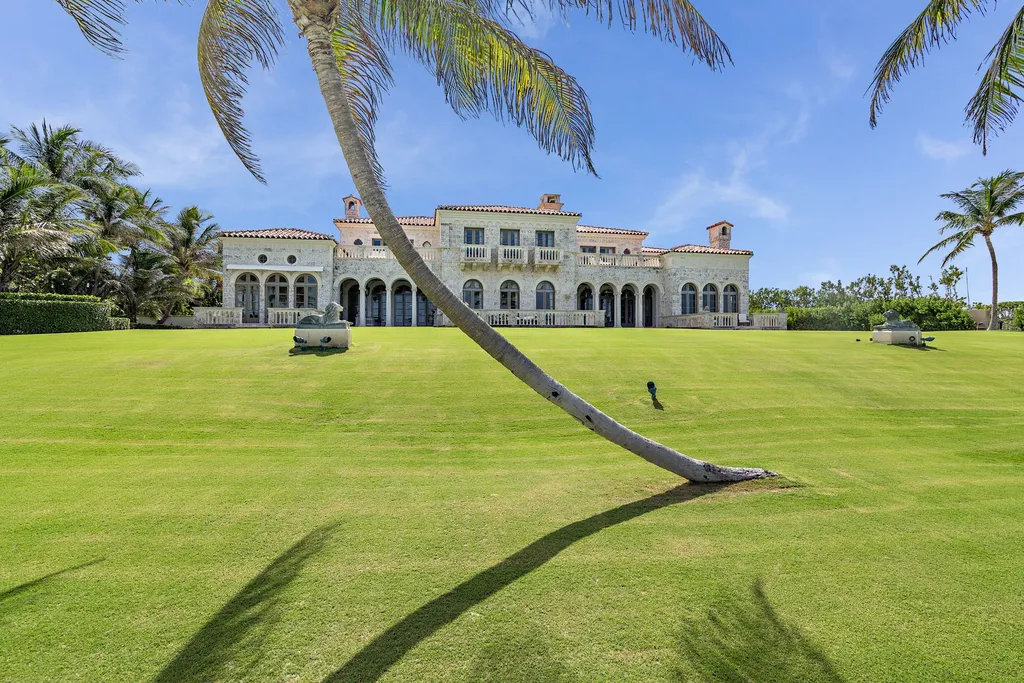 1295 S Ocean Boulevard Home in Palm Beach, Florida. Palm Beach, Florida - La Follia, an exquisite property standing as the sole direct ocean-to-lake estate on Palm Beach, emerges as one of the most prestigious and significant residences on the island. Elevated 24 feet above sea level and boasting an impressive 210 feet of direct water frontage, this Italian Renaissance home pays homage to Palm Beach's illustrious Fatio Era of the 1920s while commanding breathtaking views of the Atlantic Ocean and the Intracoastal Waterway.