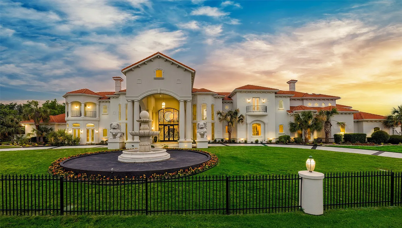 3712 Dustin Trail Home in Dalworthington Gardens, Texas. Experience the epitome of luxury and exclusivity with this breathtaking gated resort home situated on an expansive 8.5-acre estate. Every detail of this grand celebrity-style residence has been meticulously crafted, from the majestic cathedral ceilings to the mesmerizing views of the resort-style oasis.