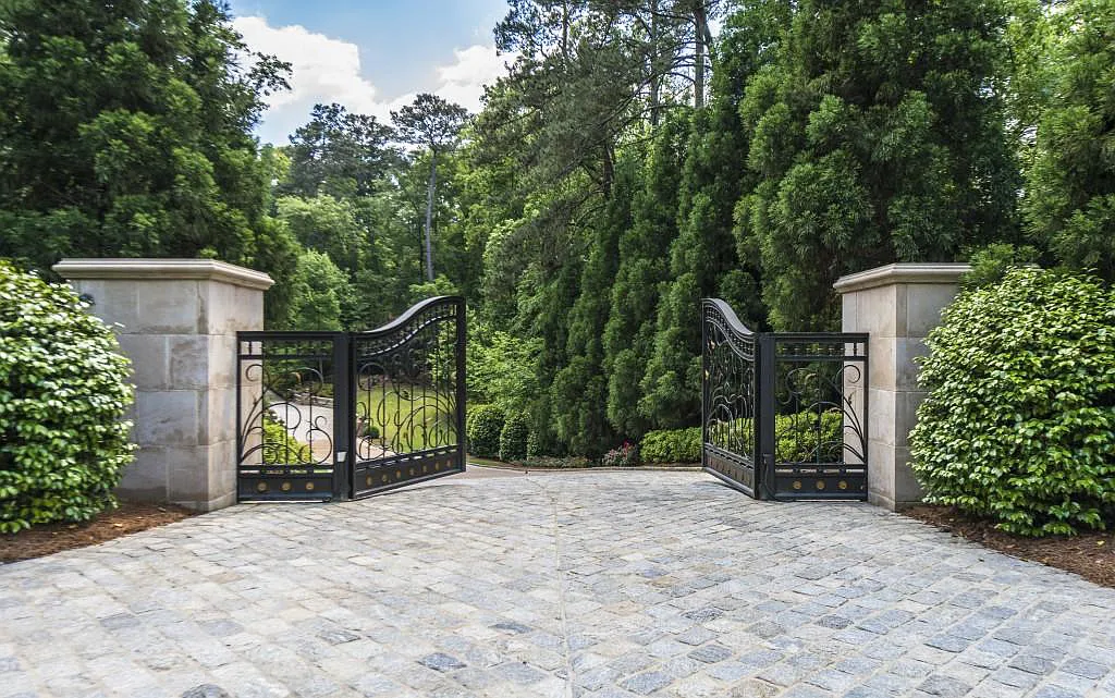 4110 Paces Ferry Road NW Home in Atlanta, Georgia. Experience ultimate privacy and luxury in Atlanta's most breathtaking gated estate, nestled on 17 acres of serene park-like grounds with extensive Chattahoochee River frontage. This remarkable property offers an unmatched array of amenities for the most discerning homeowner.