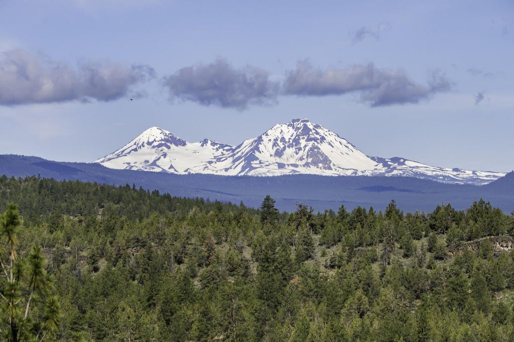 Breathtaking Panoramic Cascade Mountain Views and Rustic Elegance Define this $4.1M Luxurious Custom Home in Bend, OR