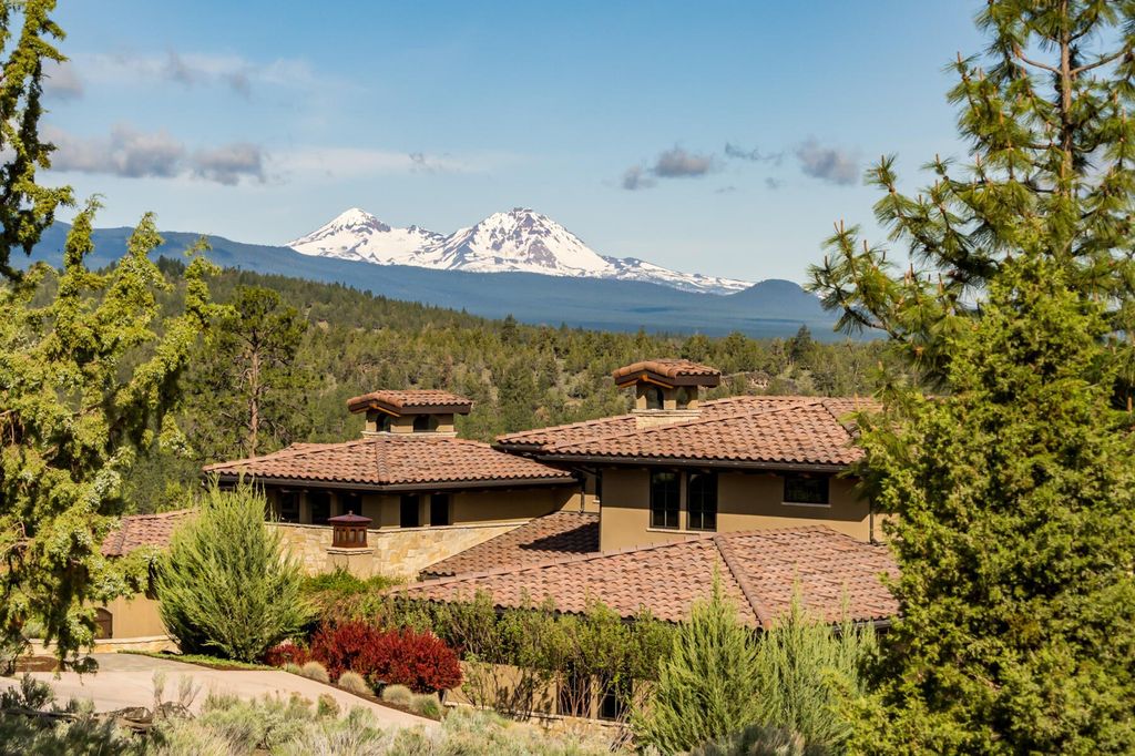 Breathtaking Panoramic Cascade Mountain Views and Rustic Elegance Define this $4.1M Luxurious Custom Home in Bend, OR