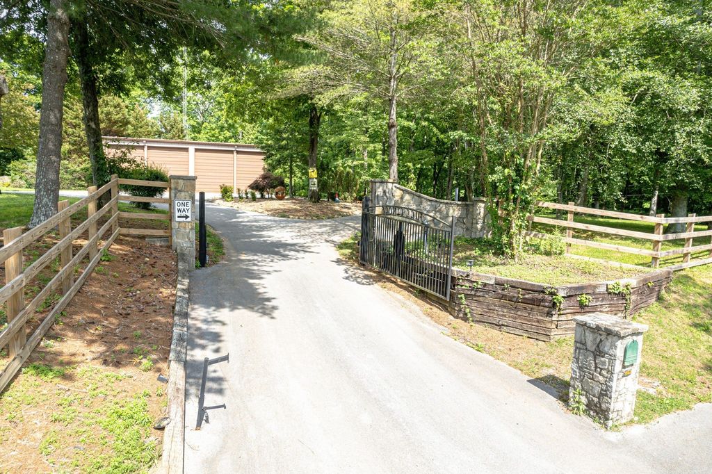 Exceptional Retreat on a Sprawling 9 Acre Estate in Winchester, TN - Ultimate Privacy and Tranquility Asking $6.9 Million