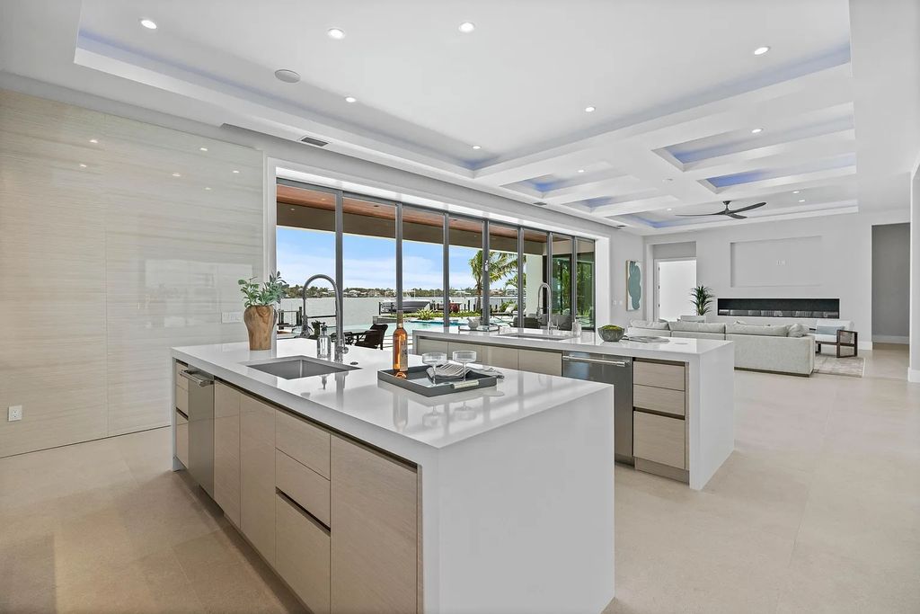 Introducing 55 River Drive, a brand new waterfront residence in Tequesta, Florida. This stunning home offers direct ocean access and boasts 100 feet of wide water views.