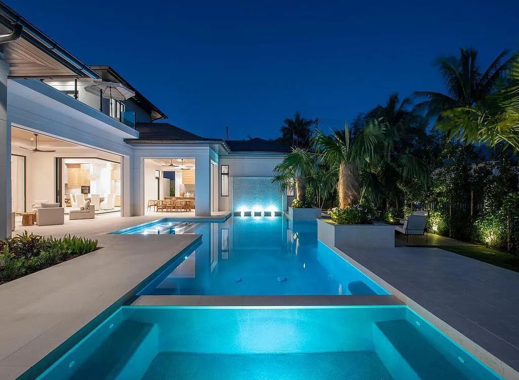 Discover luxurious living at 540 4th Avenue N in Old Naples, Florida. This brand-new home, built in 2023, features 5 beds, 6 baths, and 6,219 sq. ft. of living space.