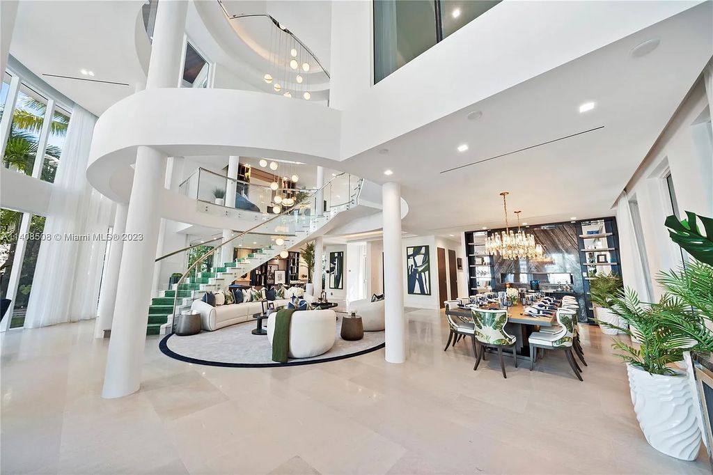 Experience the epitome of luxury waterfront living at 5785 Pine Tree Drive in Miami Beach, Florida. This newly built Neo-Classic home offers eight bedrooms, eight bathrooms, and a living area of 10,955 square feet.