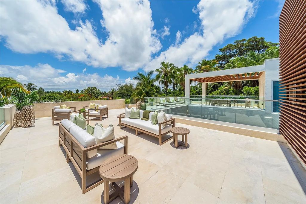 Experience the epitome of luxury waterfront living at 5785 Pine Tree Drive in Miami Beach, Florida. This newly built Neo-Classic home offers eight bedrooms, eight bathrooms, and a living area of 10,955 square feet.