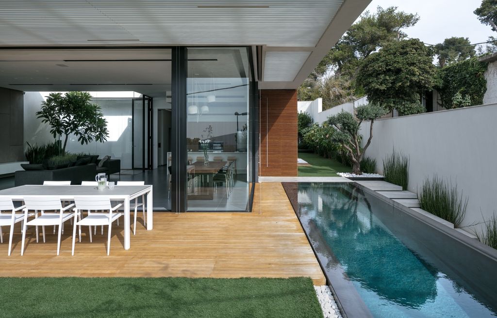 House F creates clean, modern & in-outdoor spaces by A.M.N Architecture