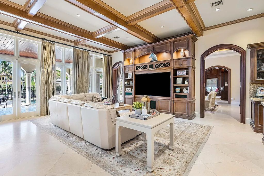 Welcome to Casa Rosa at 264 S Maya Palm Drive, Boca Raton, Florida. This stunning waterfront estate is located in the prestigious Royal Palm Yacht & Country Club and offers luxurious living on 112' of expansive waterway.