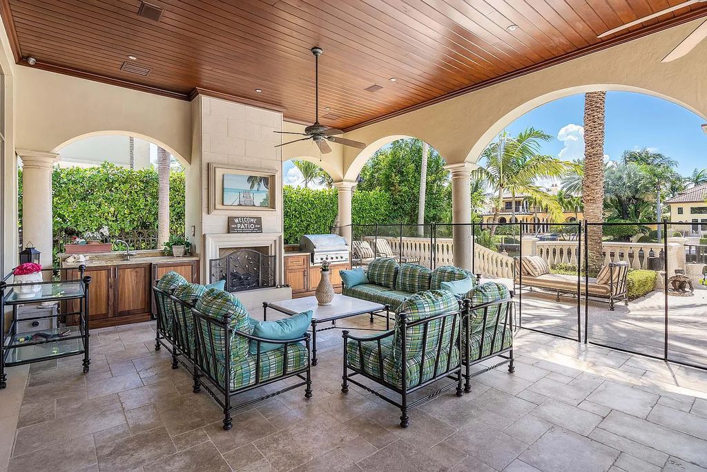 Welcome to Casa Rosa at 264 S Maya Palm Drive, Boca Raton, Florida. This stunning waterfront estate is located in the prestigious Royal Palm Yacht & Country Club and offers luxurious living on 112' of expansive waterway.