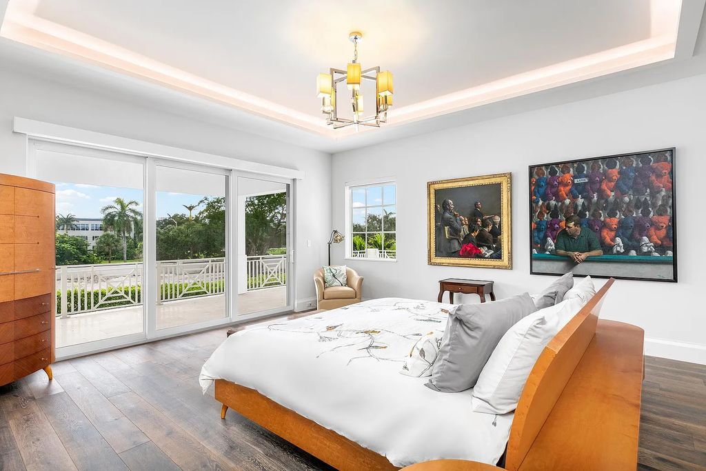 Introducing 1771 Thatch Palm Drive in Boca Raton, Florida. This exquisite 5-bedrooms, 8-bathrooms Signature Estate boasts 7,571 square feet of luxury living.