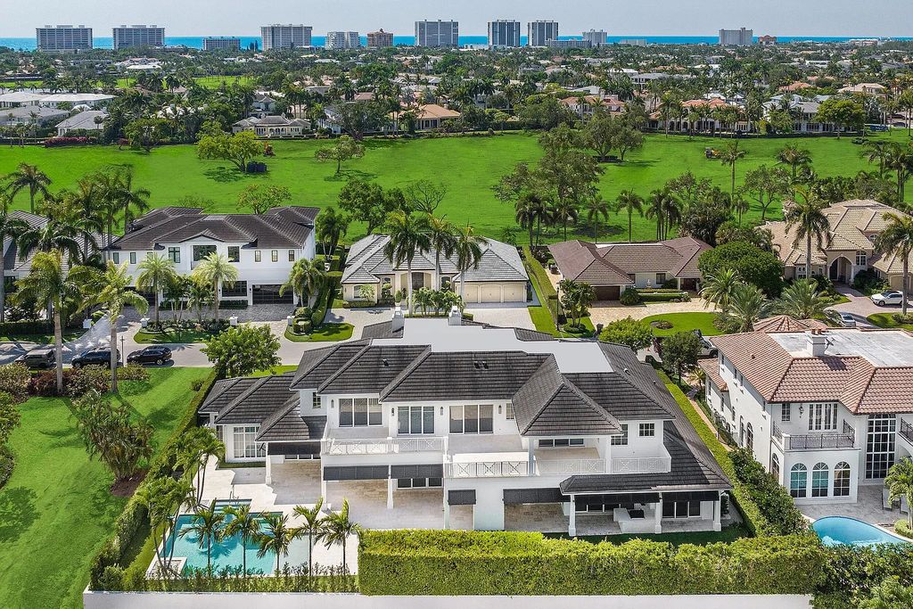 Introducing 1771 Thatch Palm Drive in Boca Raton, Florida. This exquisite 5-bedrooms, 8-bathrooms Signature Estate boasts 7,571 square feet of luxury living.