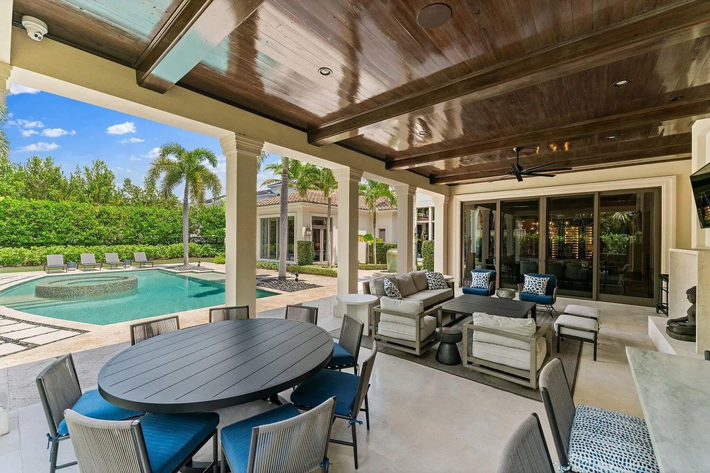 Welcome to 11771 Calleta Court, a luxurious furnished residence in Palm Beach Gardens, Florida. This exceptional home in the Grand Estates of Old Palm Golf Club offers timeless elegance, meticulous craftsmanship, and a desirable location.