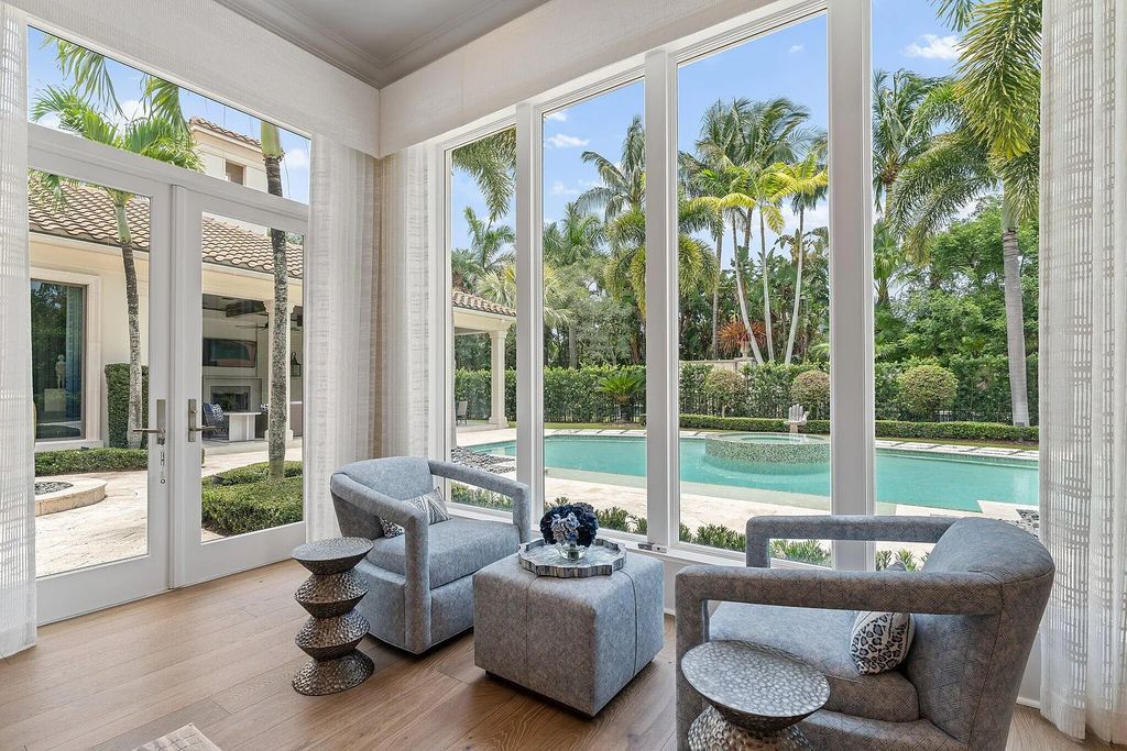 Welcome to 11771 Calleta Court, a luxurious furnished residence in Palm Beach Gardens, Florida. This exceptional home in the Grand Estates of Old Palm Golf Club offers timeless elegance, meticulous craftsmanship, and a desirable location.