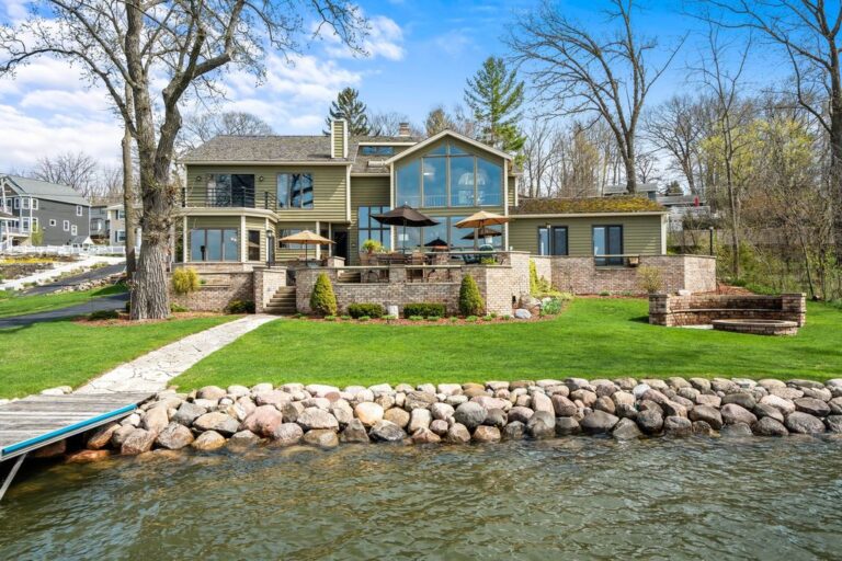 Luxurious Lakefront Retreat in Pewaukee, WI – Privacy and Serenity Await at $2.45M