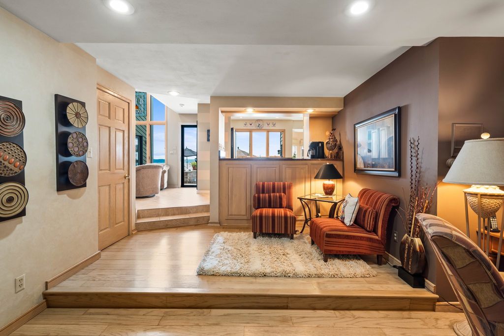 Luxurious Lakefront Retreat in Pewaukee, WI - Privacy and Serenity Await at $2.45M