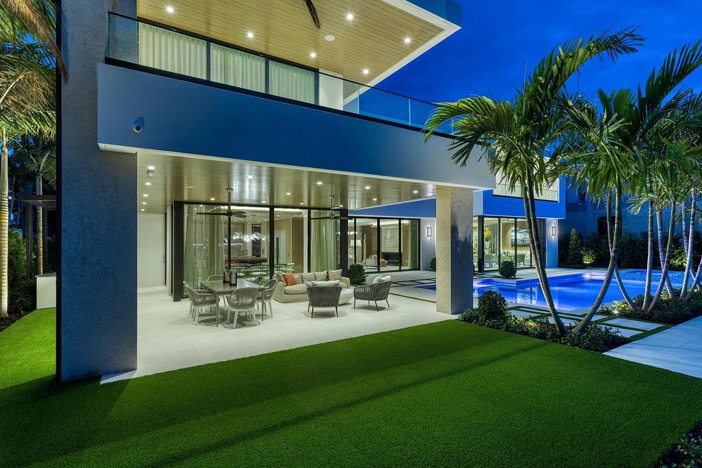Welcome to 1099 Spanish River Road, a gated architectural masterpiece in Boca Raton's prestigious 'The Estate Section.' This newly built, five-bedroom, eight-bathroom home spans 7,602 square feet, showcasing clean lines and modern style.