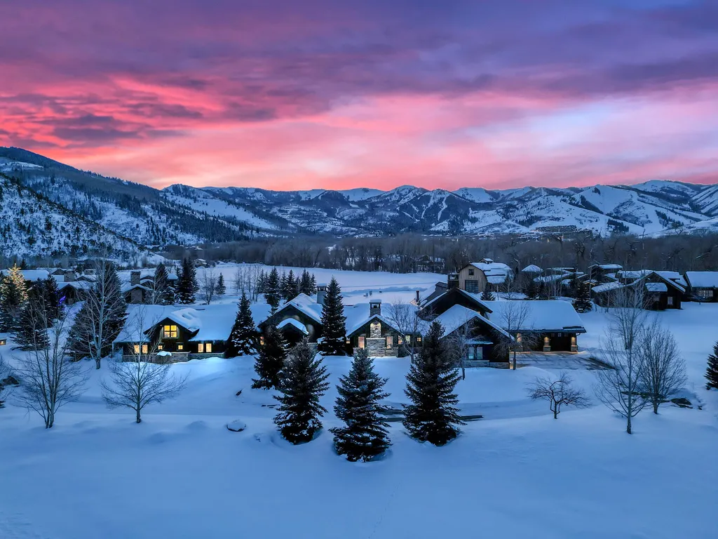 1032 Quarry Mountain Way Home in Park City, Utah. Discover this stunning modern mountain home in Park City's prestigious Quarry Mountain Ranch, offering breathtaking ski resort views and a feng shui inspired floor plan. Situated on 2.45 acres, the home boasts elegant finishes, spacious living areas, a gourmet kitchen, private owner's suite, and 4 guest suites. Enjoy a private tennis court, ponds for fishing, and proximity to top ski resorts and outdoor activities. 