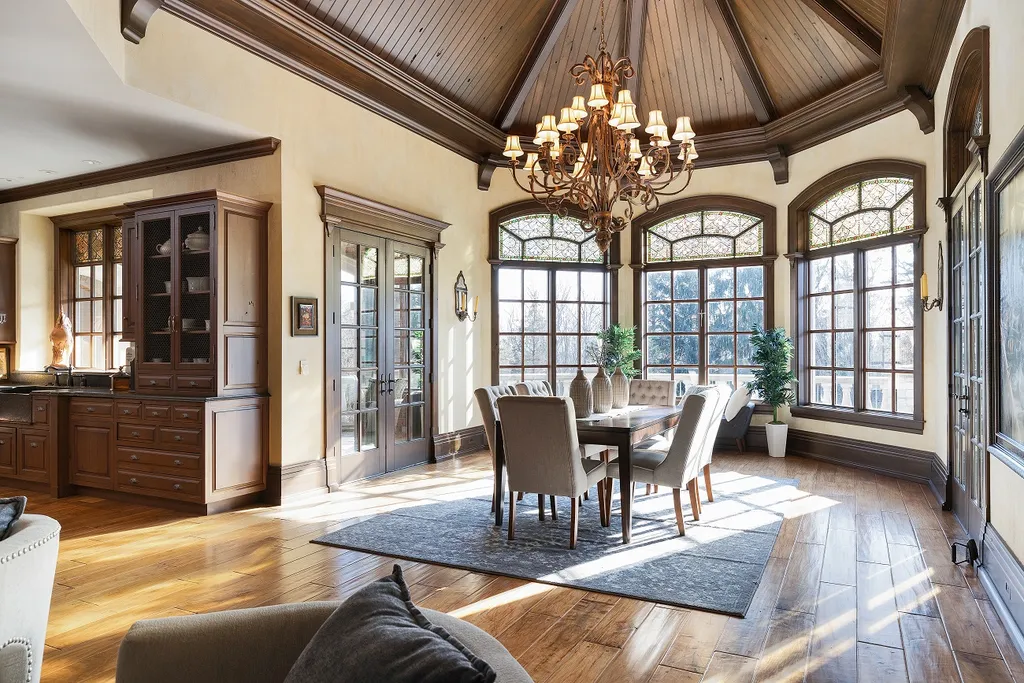 1558 Dutton Road Home in Rochester, Michigan. Discover the epitome of luxury living at this Country Estate in Oakland Township. Spread across 22 acres, the home features hand-carved wooden archways, hand-painted ceiling frescos, and hand-cut stone and gold-leafed accents.