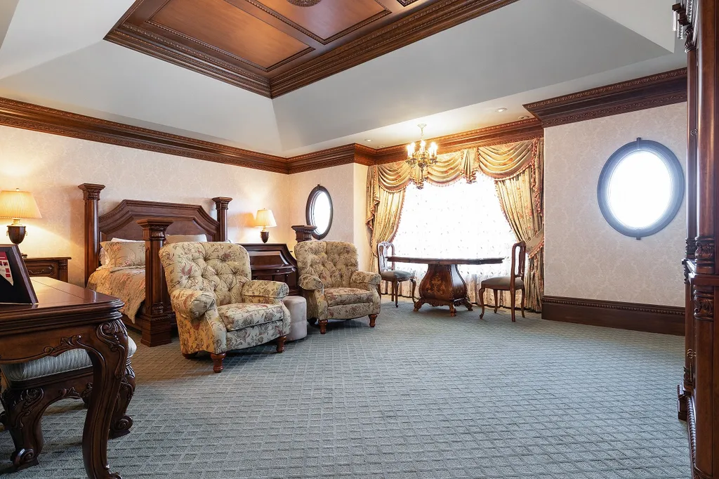 1558 Dutton Road Home in Rochester, Michigan. Discover the epitome of luxury living at this Country Estate in Oakland Township. Spread across 22 acres, the home features hand-carved wooden archways, hand-painted ceiling frescos, and hand-cut stone and gold-leafed accents.