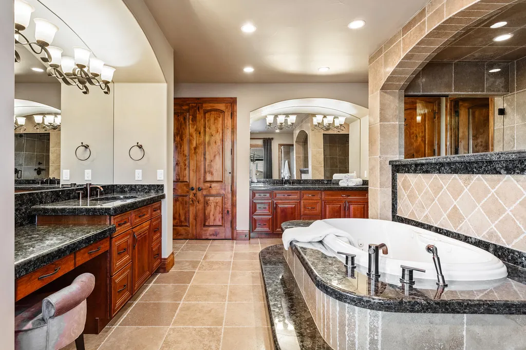 17476 West 69th Avenue Home in Arvada, Colorado. Step into a true work of art in this premier Arvada estate. Custom-built with meticulous attention to detail, this Old European-inspired home boasts luxury finishes, en-suite bedrooms, and high-tech smart home upgrades. Enjoy 7,614 sqft of living space, featuring a state-of-the-art home theater, gourmet kitchen, European sauna room, and more. 