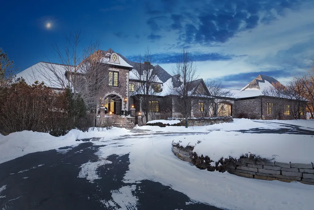 2 Rock Ridge Road Home in Barrington, Illinois. Discover the beauty of this one-of-a-kind estate in Barrington Hills, situated on 12.3 acres of picturesque land. This stunning home showcases expert craftsmanship, finest materials, and luxurious amenities. 