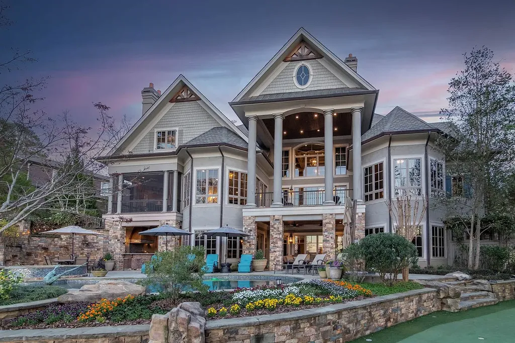 2260 Sandy Ford Home in Greensboro, Georgia. Discover the epitome of elegance and sophistication in this extraordinary lakefront home boasting over 11,000 sq ft of pure luxury. Enjoy stunning lake views, impeccable craftsmanship, and an array of high-end features. 