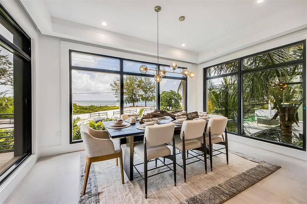 Experience luxury coastal living at 117 N Bay Boulevard, Anna Maria, Florida. This 4-bedrooms, 5-bathrooms, 3,155 square feet bayfront estate is a masterpiece of elegance.