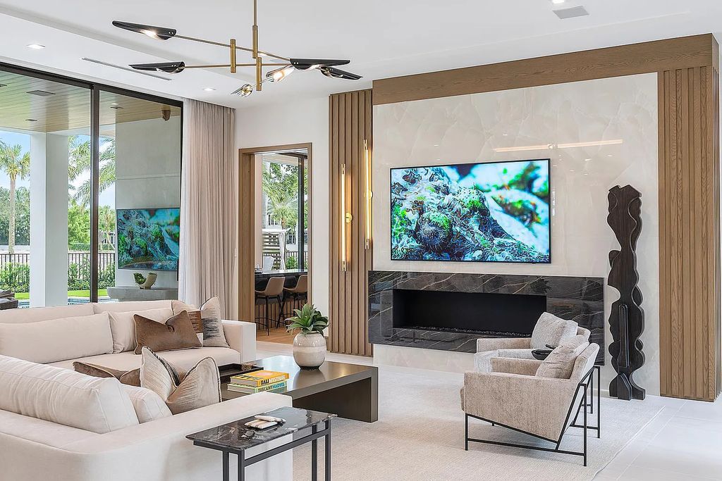 Discover 1812 Sabal Palm Circle, an extraordinary 6-bedrooms, 9-bathrooms masterpiece in Boca Raton, Florida. Crafted by SRD Building Corp., this luxurious Signature Estate offers over 8,500 square feet of splendor with stunning views of golf course fairways