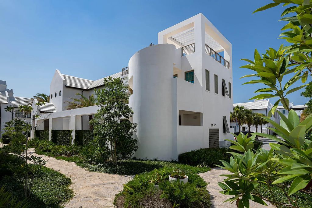 Discover modern living at its finest with this exquisite property at 62 S Charles Street, Inlet Beach, Florida. Built by Boheme Design in 2019, this architectural masterpiece offers 4 beds, 5 baths, and 3,845 sq ft of luxurious living space. Enjoy the peacefulness of Palmera Park and stunning outdoor areas, including a pool with a mesmerizing 32' water wall. Dual primary suites, a gourmet kitchen, and a media room with a wet bar elevate the living experience. Embrace the elegance, convenience, and serenity of this must-see home, complete with access to a private Beach Club.