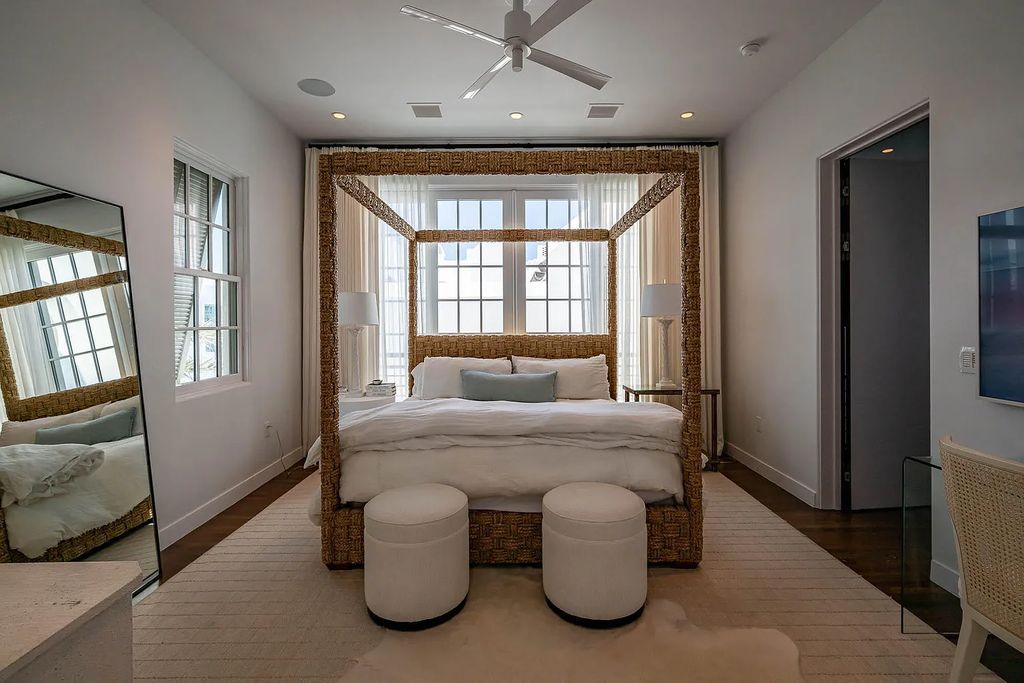 Discover modern living at its finest with this exquisite property at 62 S Charles Street, Inlet Beach, Florida. Built by Boheme Design in 2019, this architectural masterpiece offers 4 beds, 5 baths, and 3,845 sq ft of luxurious living space. Enjoy the peacefulness of Palmera Park and stunning outdoor areas, including a pool with a mesmerizing 32' water wall. Dual primary suites, a gourmet kitchen, and a media room with a wet bar elevate the living experience. Embrace the elegance, convenience, and serenity of this must-see home, complete with access to a private Beach Club.