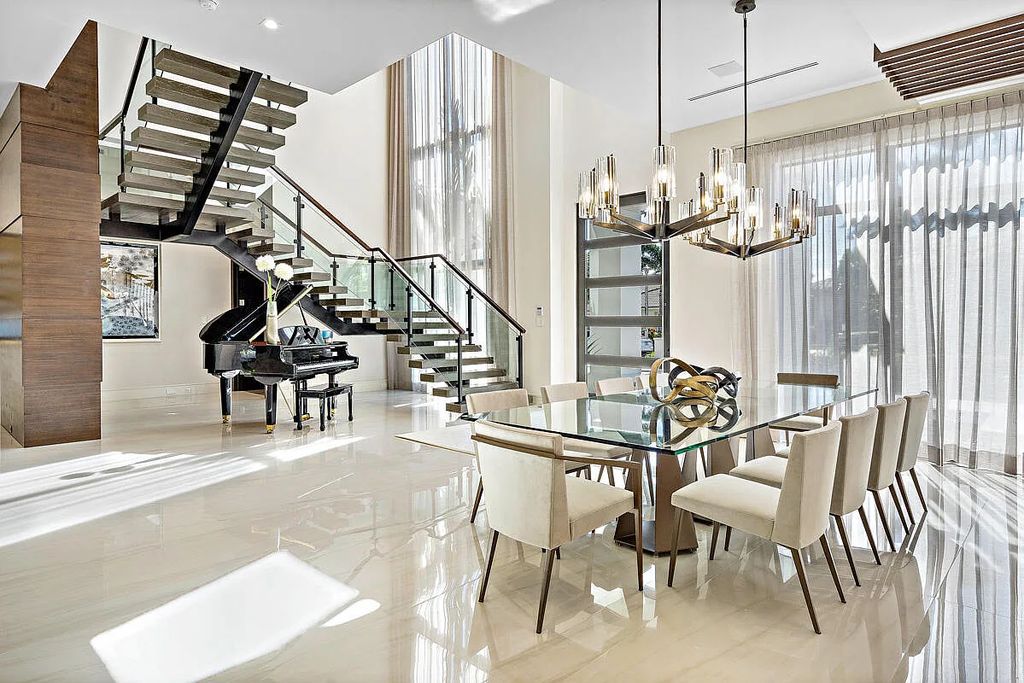 Welcome to 1693 Sabal Palm Drive, an extraordinary SRD Signature Estate in Boca Raton, Florida. This modern luxury home offers privacy, a resort-style pool, and impeccable design. With 5 bedrooms, 8 bathrooms