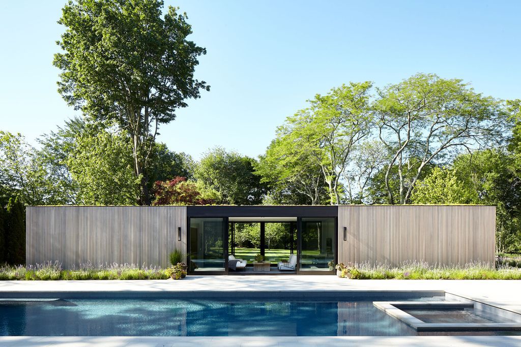 Southampton House Stands Out with Its Graceful Lines by Bradley Bayou