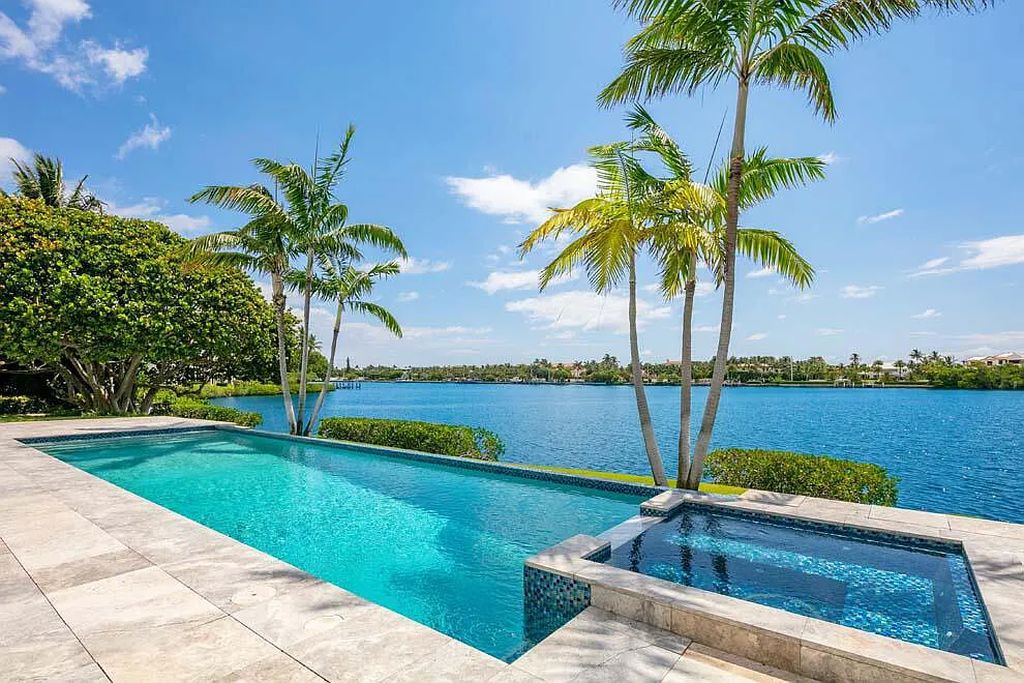 Experience the epitome of luxury living at 1540 Paslay Place, a stunning, like-new 5-bedroom estate in Manalapan, Florida.