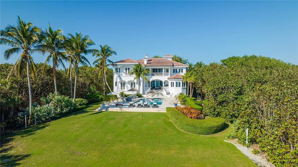 Discover the OLD RIOMAR OCEANFRONT ESTATE at 1736 Ocean Drive, Vero Beach, Florida. This grand home offers 6 bedrooms, 8.5 bathrooms, gym, resort-style pool, and a 2,000+ SF garage within its 12,500 SF area, set on a 0.66-acre lot with stunning views of the Atlantic.