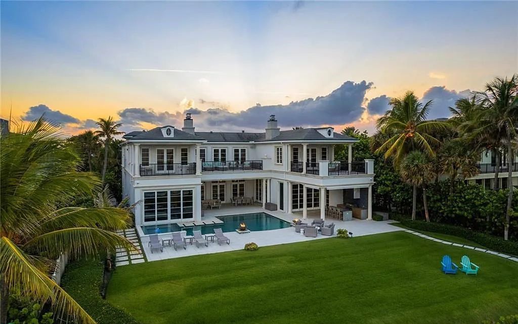 Welcome to 1001 Hillsboro Mile, a stunning oceanfront estate on Florida's Magnificent Mile. This custom-built property features 6 bedrooms, 11 bathrooms, and 12,640 square feet of living space.