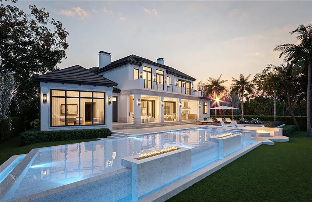 Welcome to 1365 Spyglass Lane, Naples, Florida! This soon-to-be-completed New Construction in Port Royal offers a modern coastal design and luxurious features.
