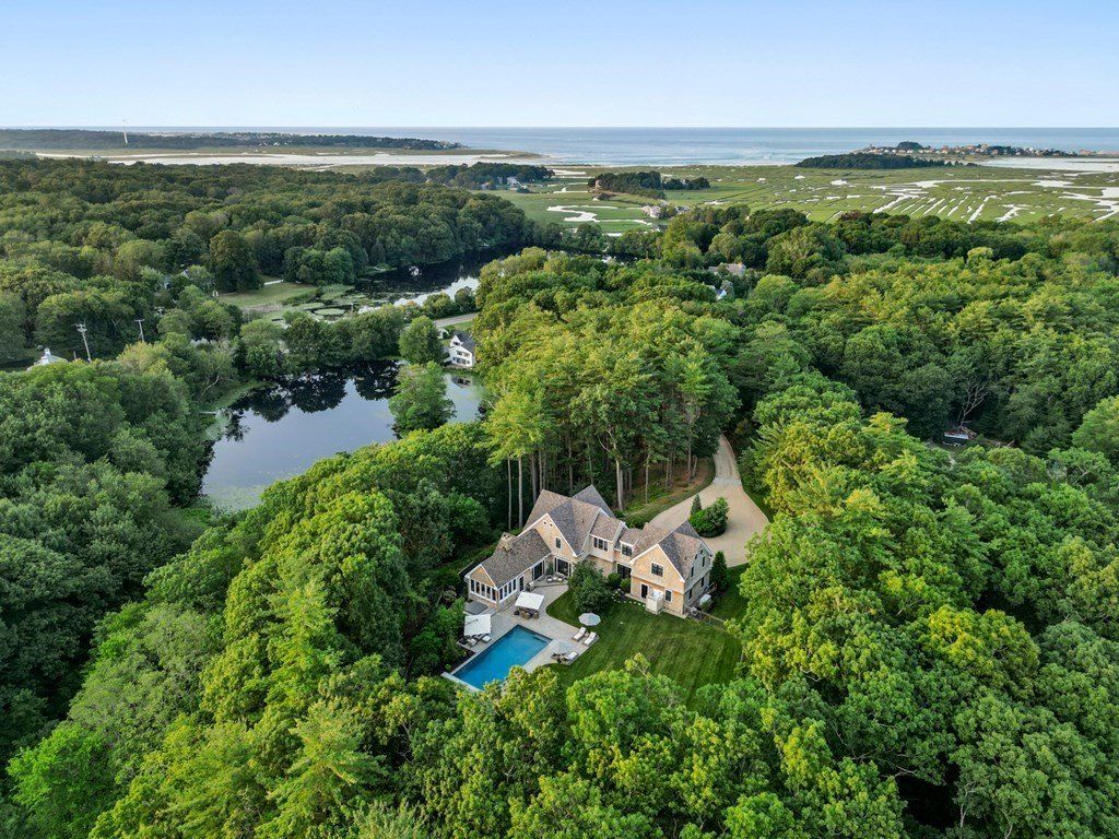 Unparalleled Privacy and Luxury: $3.95 Million Exquisite Estate on 9  Acres with Pool, Nature Trails, and Pond in Marshfield, Massachusetts