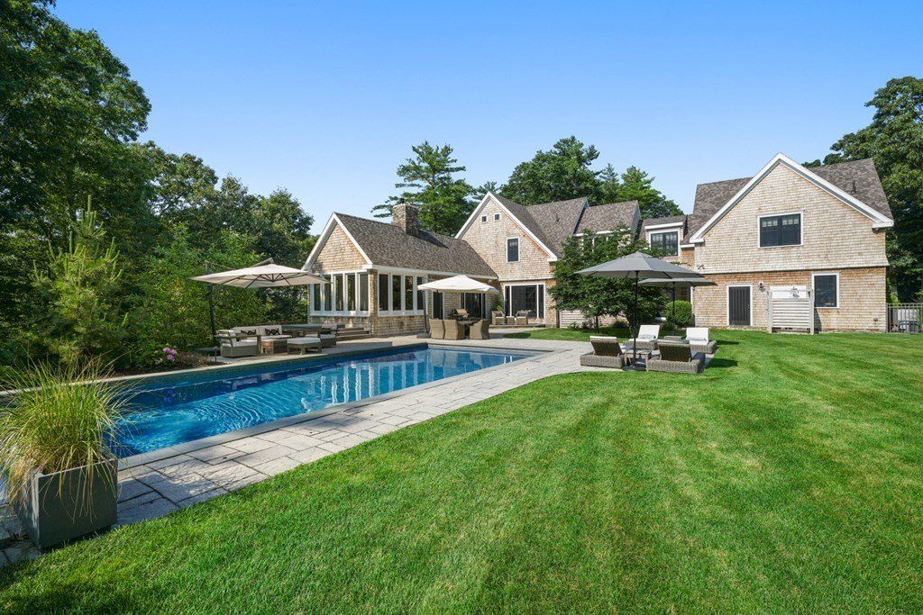 Unparalleled Privacy and Luxury: $3.95 Million Exquisite Estate on 9  Acres with Pool, Nature Trails, and Pond in Marshfield, Massachusetts