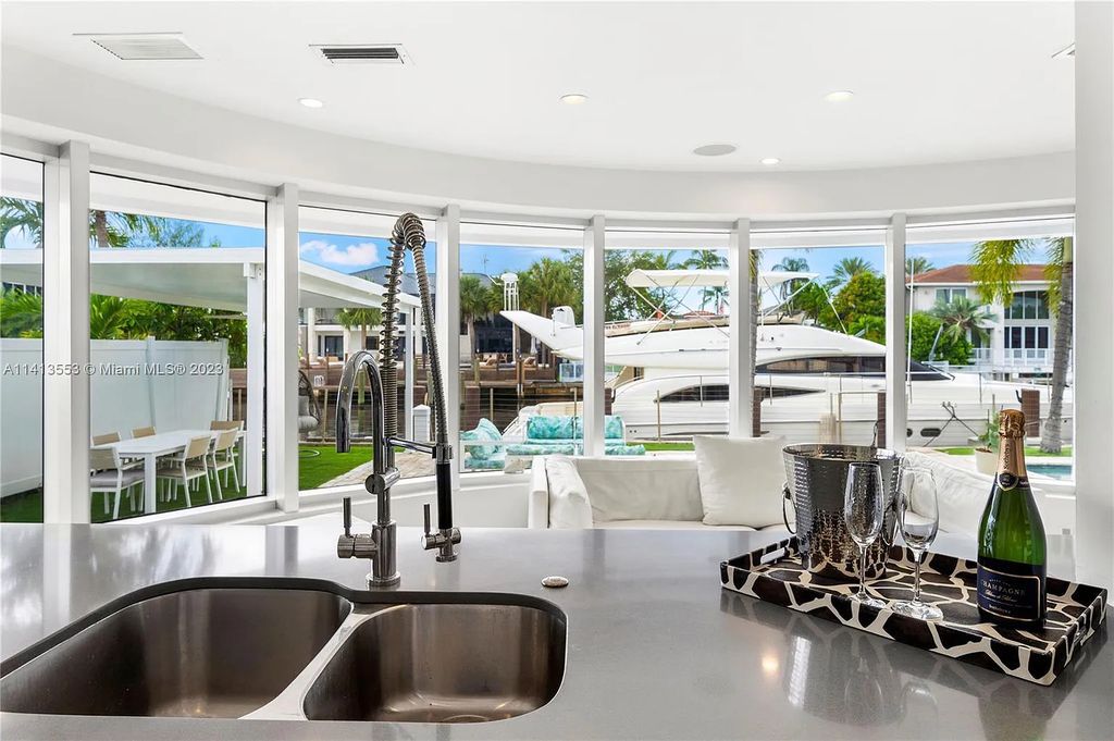 Experience the epitome of modern luxury living at 3344 NE 167th Street, North Miami Beach, Florida! This sleek, all-modern mansion boasts 6 bedrooms, 7 bathrooms, and 6,669 square feet of living space. Built in 2007, it offers an 80 ft waterfront with an outfitted dock, and an elevator.