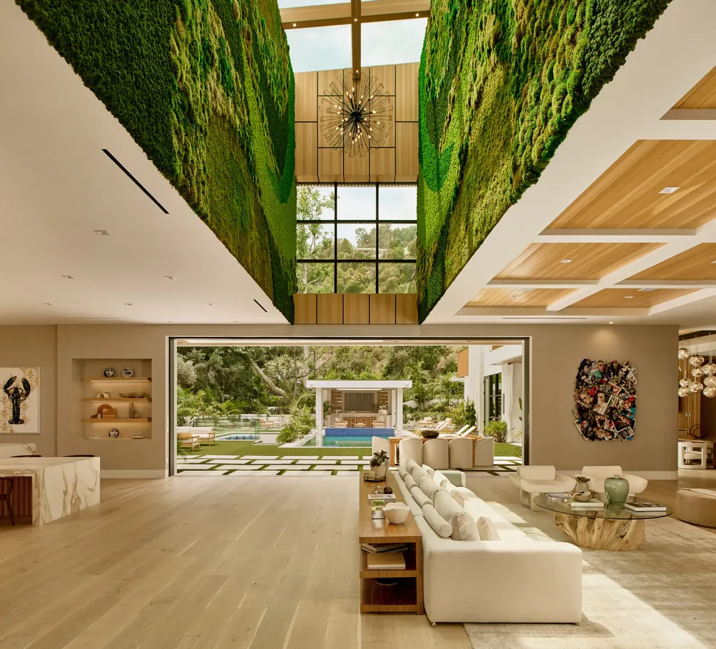 13187 Chalon Road Home in Los Angeles, California. Embrace the epitome of modern luxury living at Allure, a stunning estate designed by award-winning Developer Ramtin Ray Nosrati. Set on 1.3 acres of picturesque California landscape, this idyllic paradise offers resort-quality amenities including a pickleball court, a professional-size basketball/sports court, putting green, and more. 