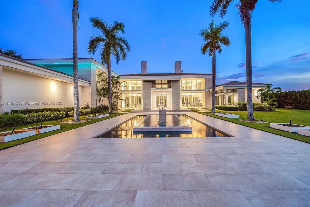 16720 Stratford Court Home in Southwest Ranches, Florida. Step into the realm of modern luxury with this extraordinary 2017-built residence. Encompassing over 13,600 sq ft of living space on a sprawling 2.4-acre lot, this architectural masterpiece features 6 bedrooms, resort-style amenities including a pool and theater, and the possibility of an adjoining 2.4-acre lot.