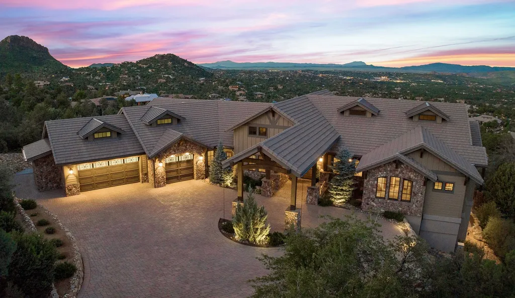 2162 Forest Mountain Road Home in Prescott, Arizona. Experience the epitome of luxury living in this exceptional estate nestled in the prestigious community of Hassayampa in Prescott, AZ. With stunning 260-degree mountain views, this generational home offers warm living spaces adorned with wood beams and natural stone. 